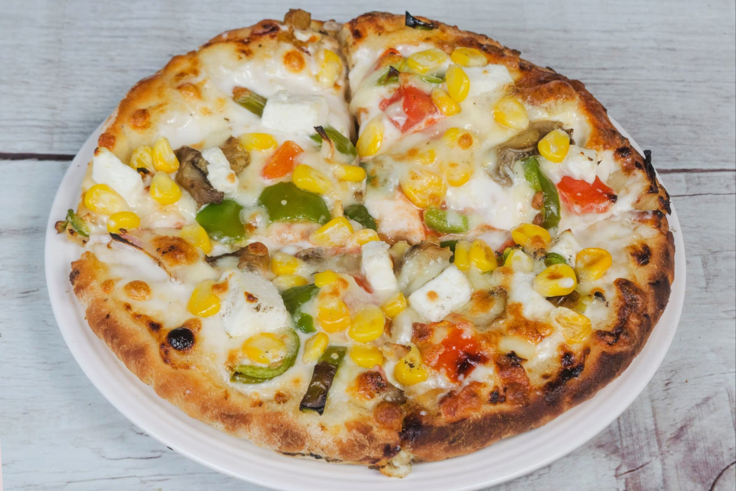 Cheese onion corn pizza